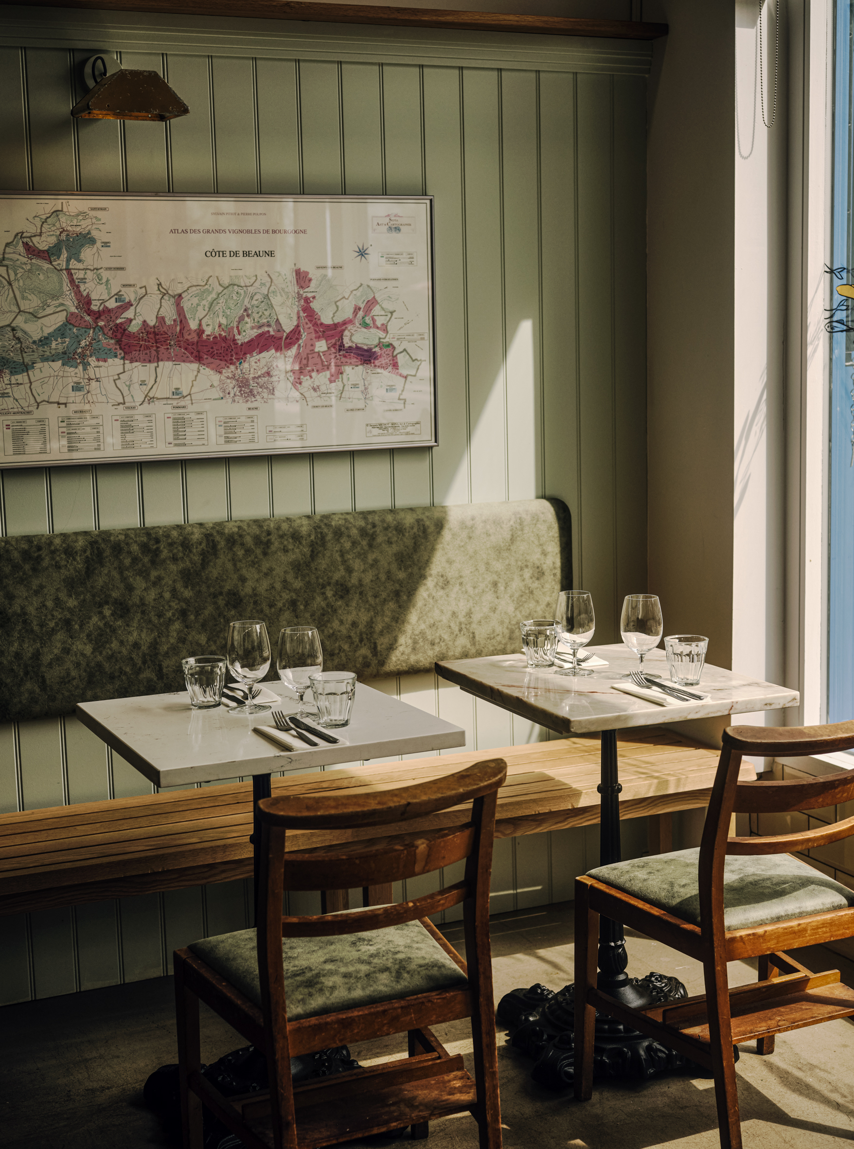 HH LSC Swains Lane Interiors 003 Small Tables and chair setting in the restaurant